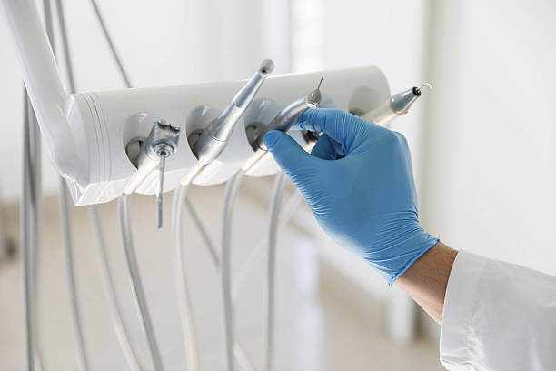 Professional Invisalign Clear Aligners technician working in Peralta, NM